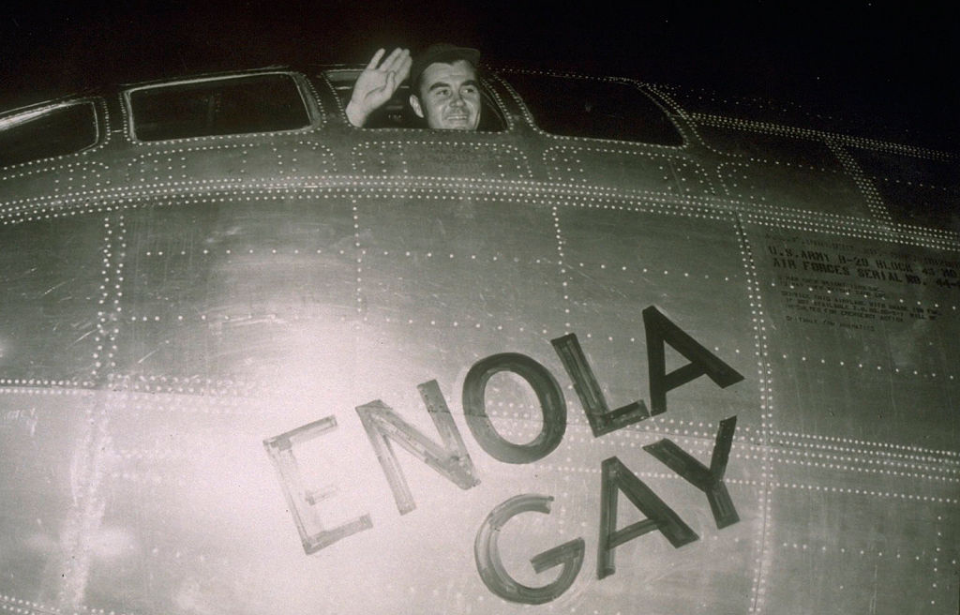 Paul Tibbets sitting in the cockpit of the Enola Gay