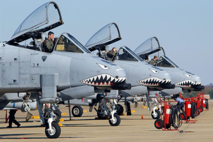 Three Fairchild Republic A-10 Thunderbolt IIs parked in a row