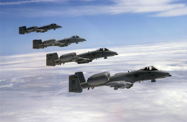 Four Fairchild Republic A-10 Thunderbolt IIs in flight