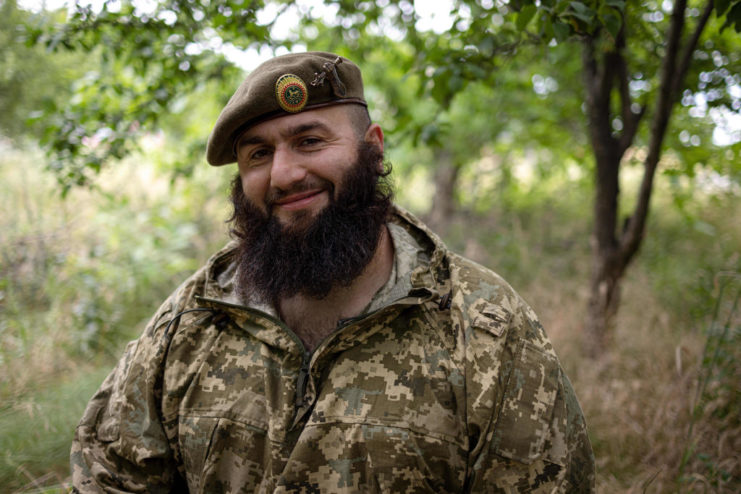 Bandera, a Chechen fighter, smiling