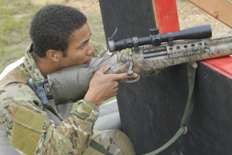 Nicholas Irving aiming his firearm