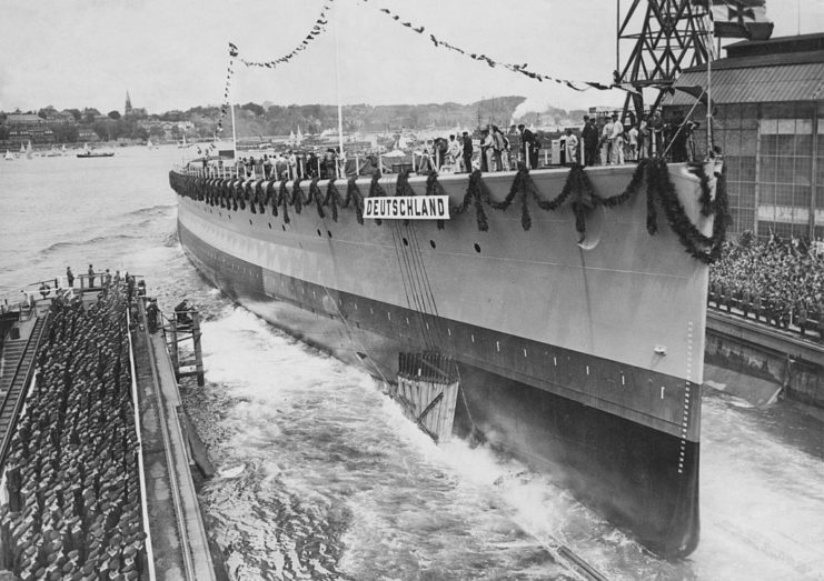 Sailors watching the launch of the German cruiser Deutschland