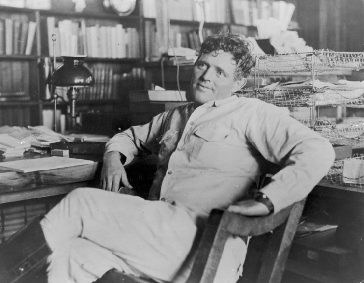 Jack London sitting in a chair