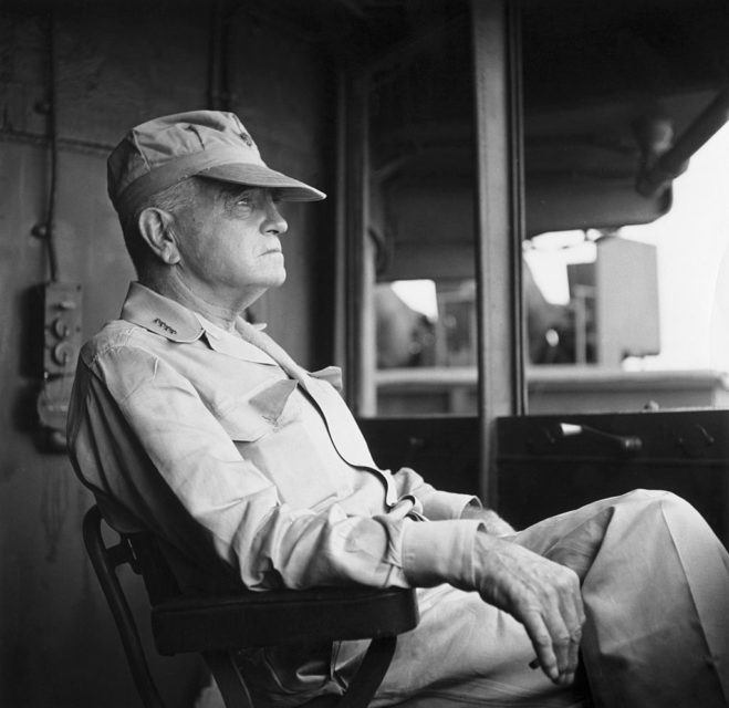 Admiral William F. Halsey Jr. sitting in a chair