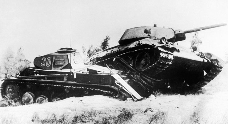 Red Army tank on top of a German Panzer tank