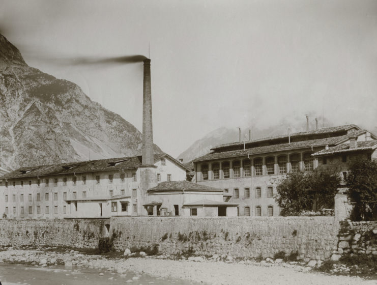 Smoke coming out of a factory's smokestack