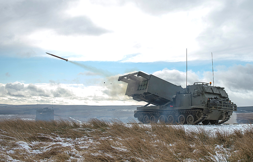 M270 MLRS launching a rocket