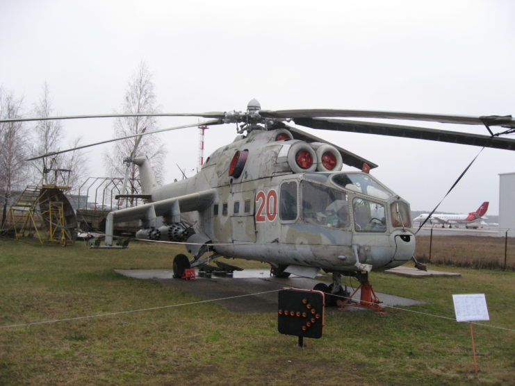 An early version of the Mil Mi-24A Hinds parked outside