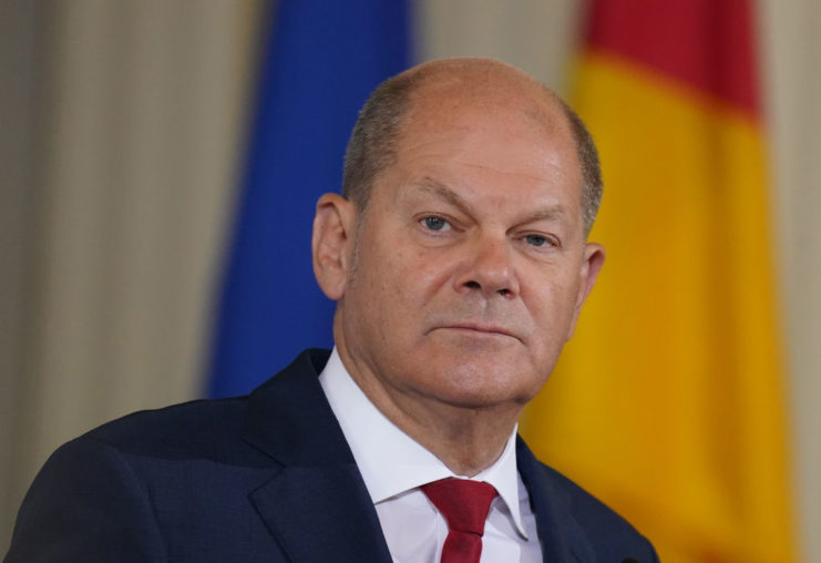 German Chancellor Olaf Scholz looking to the side