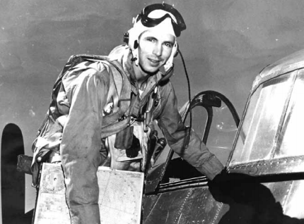 Patrick Fleming climbing into the cockpit of his aircraft