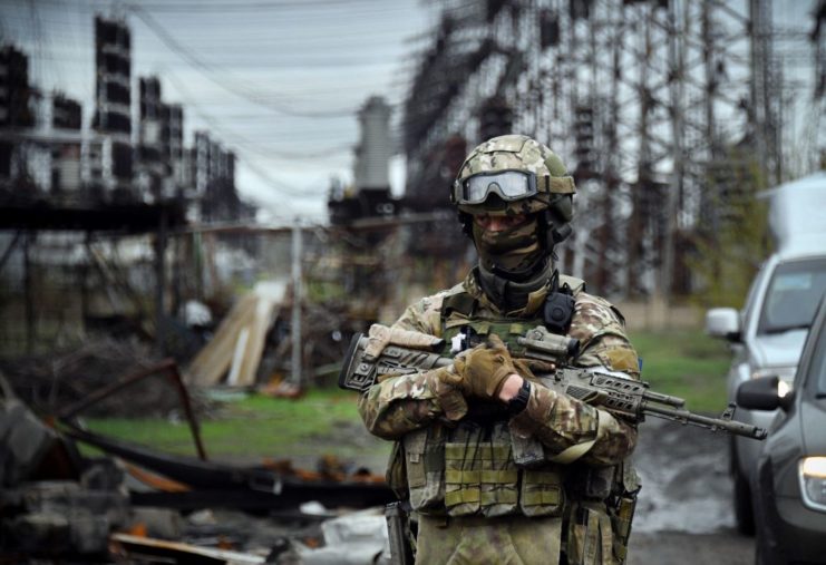 Russian soldier standing outside