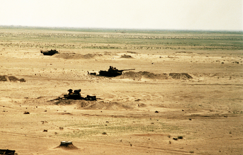 Destroyed Iraqi tanks in defensive entrenchments