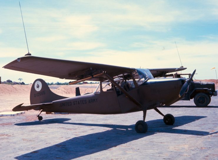 Cessna L-19A Bird Dog parked on the runway