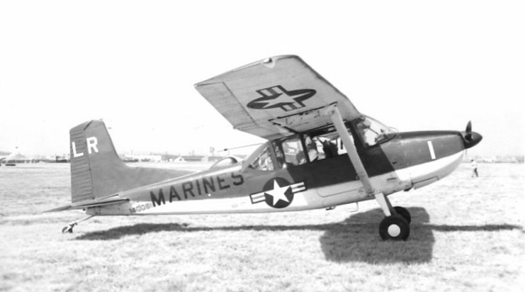 Cessna OE-2 parked on the grass