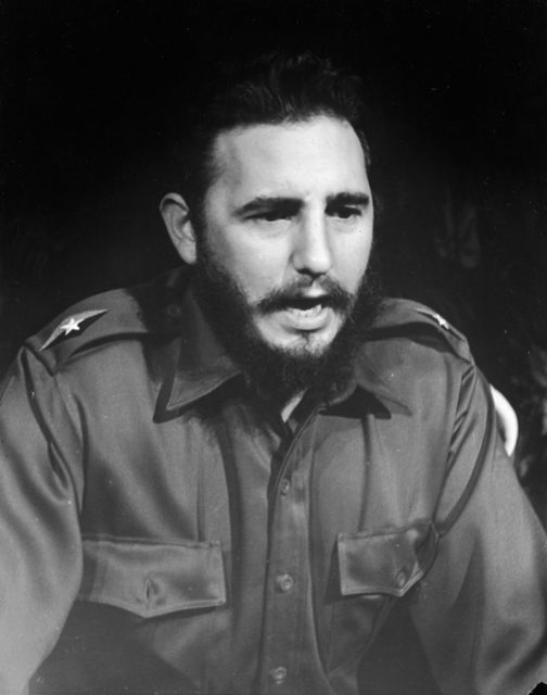 Fidel Castro standing with his mouth open