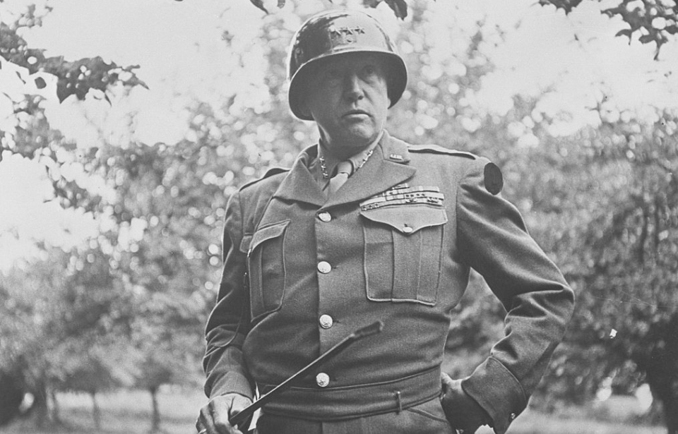 George Patton standing in military uniform