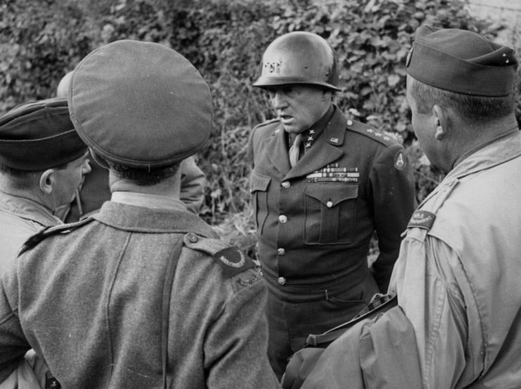 George Patton speaking with Allied war correspondents