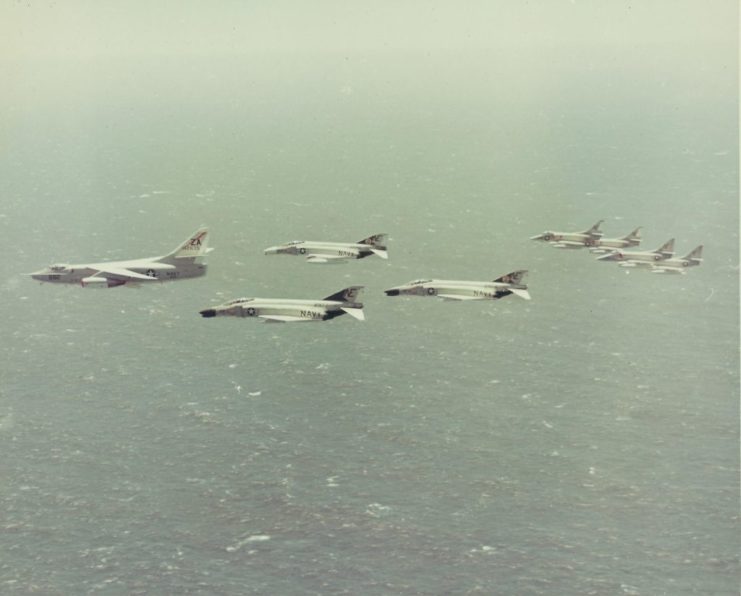McDonnell Douglas F-4 Phantom IIs flying over water
