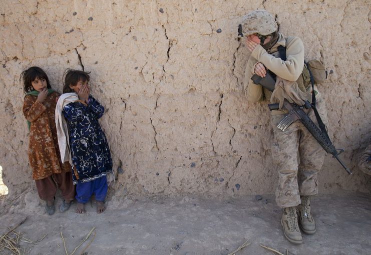 Catherine Broussard speaking with two Afghani girls