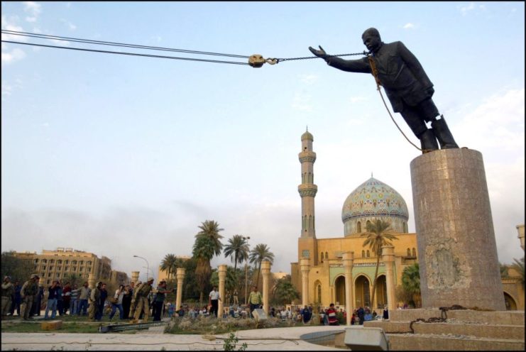 Statue of Saddam Hussein being taken down
