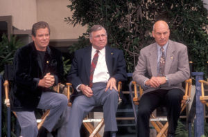 William Shatner, Gene Roddenberry and Patrick Stewart sitting in chairs
