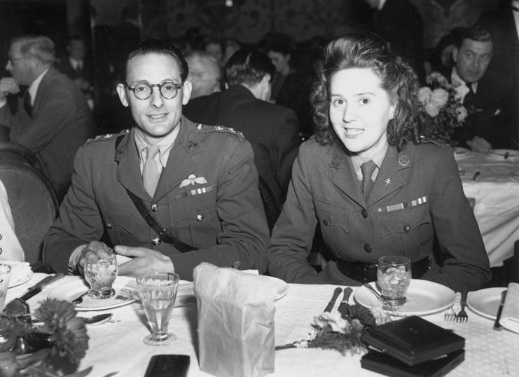 Odette Sansom sitting at a table with Peter Churchill