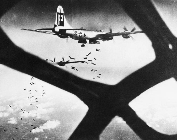 Boeing B-29 Superfortress dropping bombs mid-flight