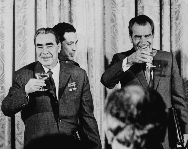 Richard Nixon standing with Leonid Brezhnev