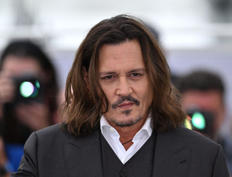 Johnny Depp posing on a red carpet