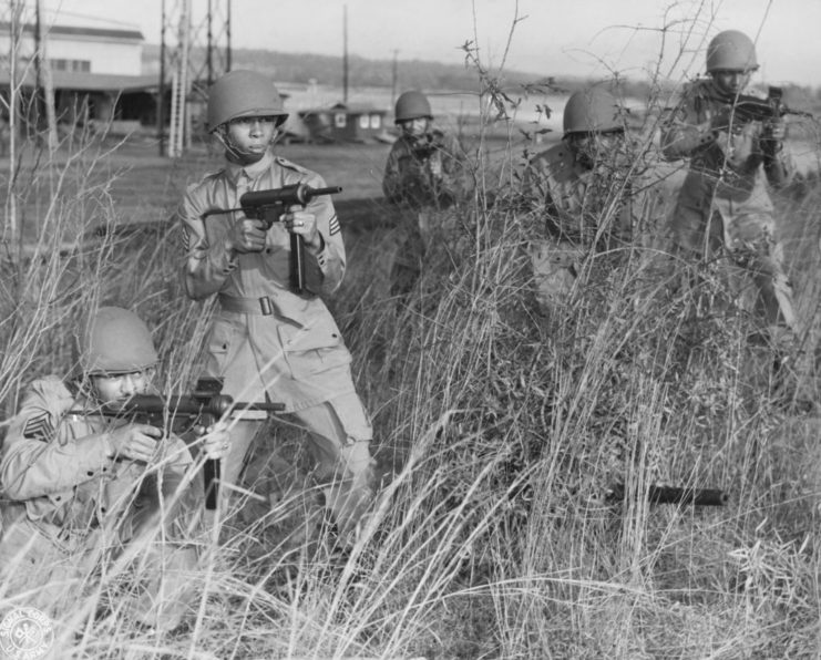 US infantrymen aiming M3 "Grease Guns"