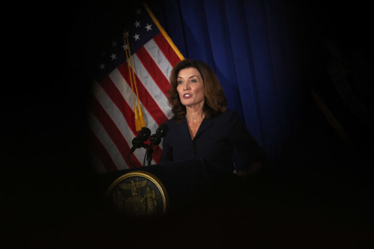 Kathy Hochul speaking at a podium