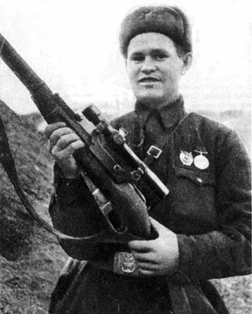 Vasily Zaytsev holding his sniper rifle