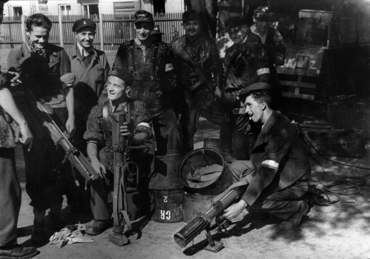 Polish soldiers standing in a group with PIATS