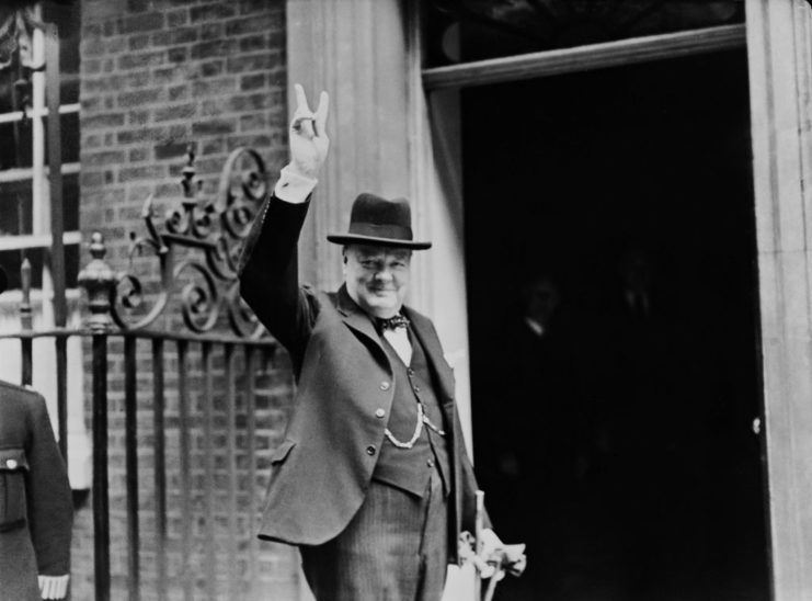 Winston Churchill holding up his "V for victory" sign