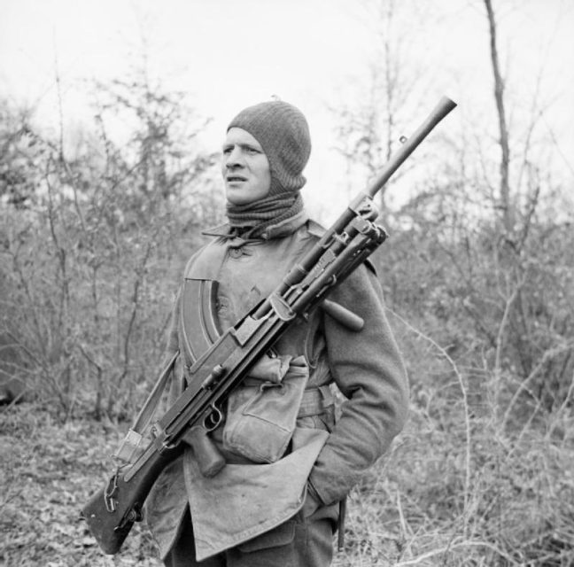 British soldier with a Bren light machine gun equipped across his chest