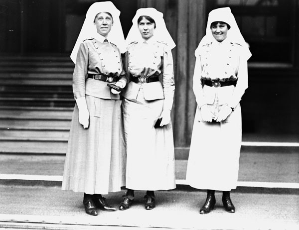 Three nursing sisters standing in uniform