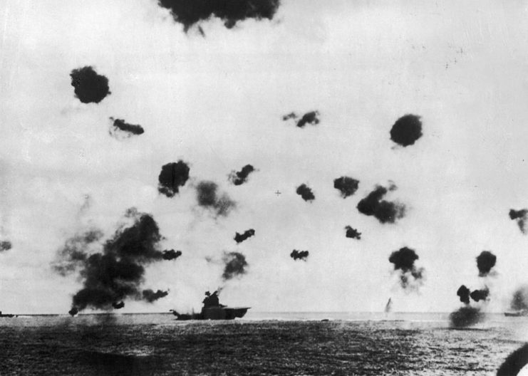 USS Yorktown (CV-5) being attacked by Japanese aircraft while at sea