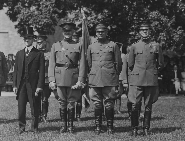 Newton D. Baker, John J. Pershing, William M. Wright and Douglas MacArthur standing together in uniform