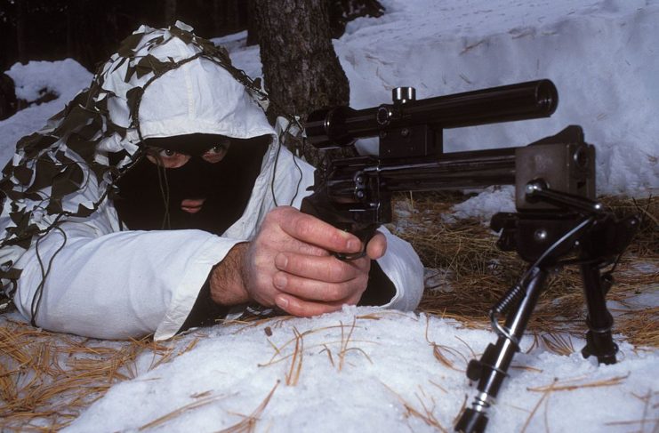 GIGN member aiming his Manurhin MR 73 revolver while lying on his stomach