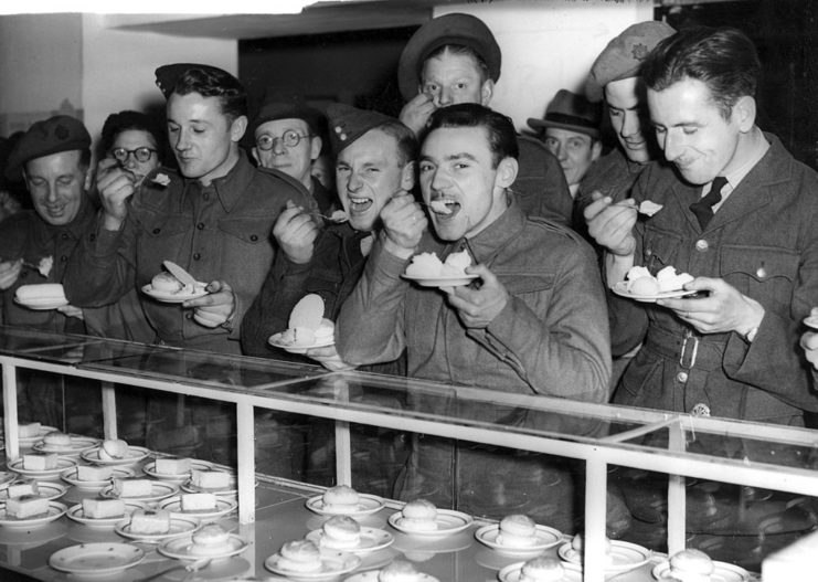 Group of British soldiers eating ice cream