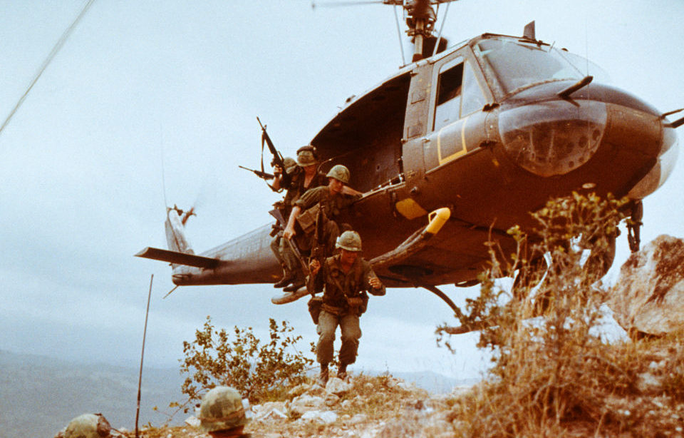 Cavalry Scouts jumping out of a helicopter hovering low over the ground