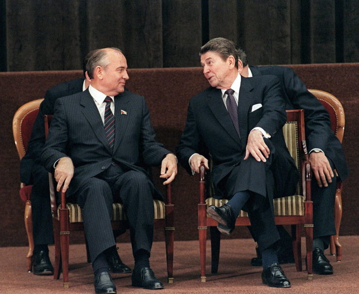 Ronald Reagan and Mikhail Gorbachev sitting in chairs