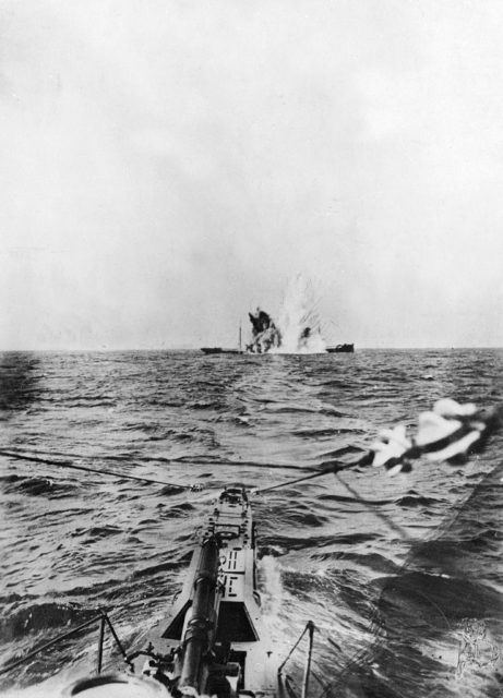 View of a torpedo fired from SM U-35 at an exploding ship in the distance