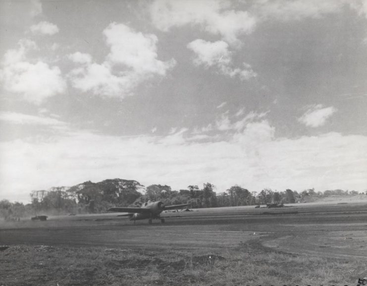 Aircraft taxiing down a runway