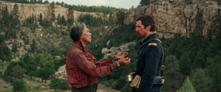 Wes Studi and Christian Bale as Chief Yellow Hawk and Captain Joseph J. Blocker in 'Hostile'