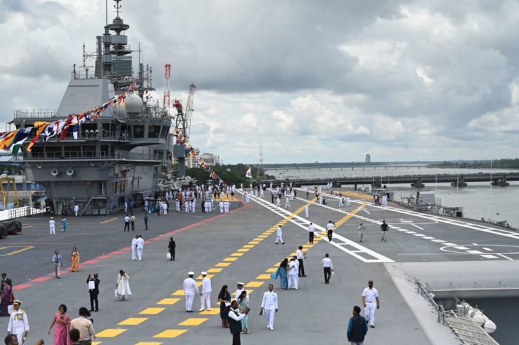 People walking on the deck of the INS Vikrant