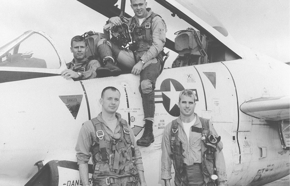 John McCain and three squad members standing around a North American T-2 Buckeye