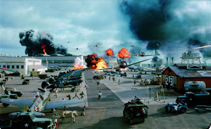 Publicity still from 'Pearl Harbor,' featuring grounded aircraft on fire