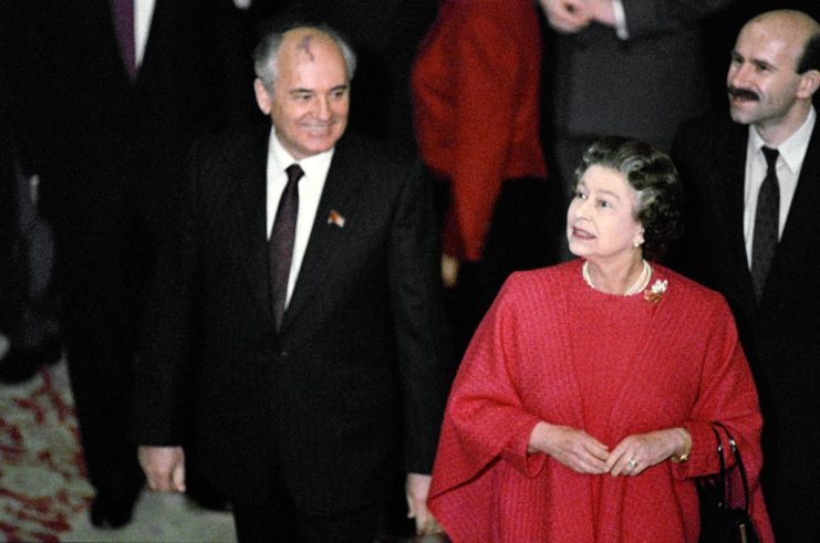 Mikhail Gorbachev standing next to Queen Elizabeth II