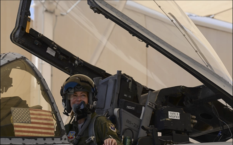 Kim Campbell sitting in the cockpit of a Republic Fairchild A-10 Thunderbolt II